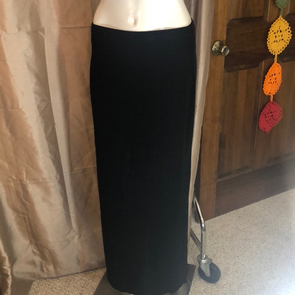 Stretchy jet black long slip on skirt with slit